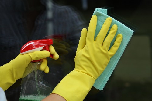 Carpet cleaning team preparing equipment with safety checks in W1W