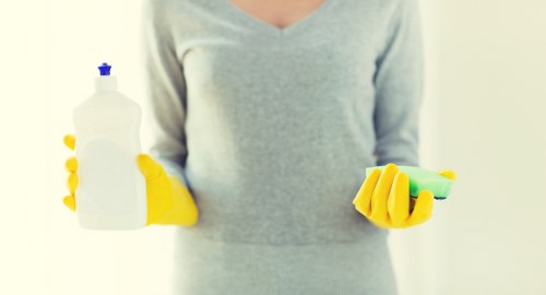 Professional cleaners maintaining a central London office kitchen and shared area