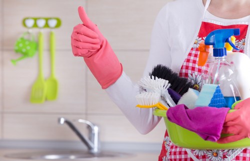 Professional cleaner working in a W1W kitchen